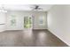 Bright, airy living room with modern floors and sliding glass door to patio at 540 Truman Dr, Goose Creek, SC 29445