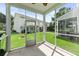 A lovely screened-in porch provides an ideal outdoor space for relaxing while enjoying views of the green lawn at 540 Truman Dr, Goose Creek, SC 29445