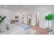 Bright main bedroom featuring a king bed and ensuite bathroom entrance, offering a private and relaxing space at 5710 Barbary Coast Rd, Hollywood, SC 29449