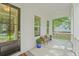Cozy front porch featuring a bench, plants, and natural light, creating a welcoming outdoor space at 5710 Barbary Coast Rd, Hollywood, SC 29449