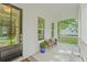 Cozy front porch featuring a bench, plants, and natural light, creating a welcoming outdoor space at 5710 Barbary Coast Rd, Hollywood, SC 29449