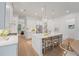 Spacious kitchen with a large island, bar stool seating, stainless steel appliances, and pendant lighting at 5710 Barbary Coast Rd, Hollywood, SC 29449