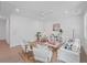 Bright and airy living room with cozy decor, including a play tent, rug, and modern furniture at 5710 Barbary Coast Rd, Hollywood, SC 29449