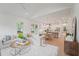 Bright and airy living room featuring hardwood floors, large windows and an open floor plan at 5710 Barbary Coast Rd, Hollywood, SC 29449