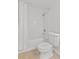 This bathroom features a shower-tub combo with white subway tile and a white shower curtain at 633 Stono Edge Dr, Charleston, SC 29412