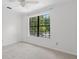 This bedroom is spacious and bright with a large window that offers a scenic view at 633 Stono Edge Dr, Charleston, SC 29412