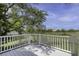 Spacious white deck with scenic views, perfect for outdoor relaxation and entertaining with nature's beauty at 633 Stono Edge Dr, Charleston, SC 29412