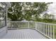 Relax on the deck, surrounded by lush greenery, offering a private and peaceful outdoor retreat at 633 Stono Edge Dr, Charleston, SC 29412