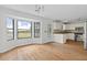 Bright dining area featuring hardwood floors and bay window providing great natural light and outdoor views at 633 Stono Edge Dr, Charleston, SC 29412