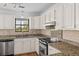 Kitchen with granite countertops and stainless steel appliances at 633 Stono Edge Dr, Charleston, SC 29412