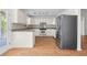 Bright kitchen featuring granite countertops, stainless steel appliances, and ample storage space at 633 Stono Edge Dr, Charleston, SC 29412