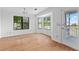 Living Room with bay window and door to deck with pond view at 633 Stono Edge Dr, Charleston, SC 29412