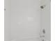 The shower is enclosed with white subway tile and features updated fixtures at 633 Stono Edge Dr, Charleston, SC 29412