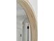 Close up of elegant wood arched doorway at 743 Hills St, Mount Pleasant, SC 29464