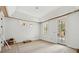 Bright room with coffered ceilings, a doorway to the outside, and several windows at 743 Hills St, Mount Pleasant, SC 29464