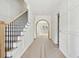 Spacious entryway with staircase and arched doorway at 743 Hills St, Mount Pleasant, SC 29464