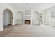 Living room with built-in shelving and archways at 743 Hills St, Mount Pleasant, SC 29464
