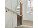 Top-down view of the staircase showcasing the modern railing and newly installed windows with natural light at 743 Hills St, Mount Pleasant, SC 29464