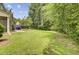 Large backyard with lush green grass at 810 Bibury Ct, Charleston, SC 29414