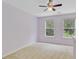 Bedroom with two windows providing natural light and a ceiling fan at 810 Bibury Ct, Charleston, SC 29414