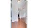 Warm and inviting entryway featuring hardwood floors and an arched doorway at 810 Bibury Ct, Charleston, SC 29414