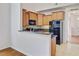 Kitchen featuring stainless steel appliances, granite countertops, and light wood cabinets at 810 Bibury Ct, Charleston, SC 29414