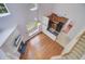 Bright open living area features fireplace and kitchen with bar top seating at 810 Bibury Ct, Charleston, SC 29414