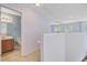 Open loft area with views of the bathroom and a ceiling fan at 810 Bibury Ct, Charleston, SC 29414