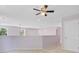 Open loft area with carpeting, windows, and access to other rooms at 810 Bibury Ct, Charleston, SC 29414