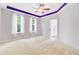 Large main bedroom with a ceiling fan, large windows, and open entryways at 810 Bibury Ct, Charleston, SC 29414