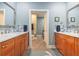 Spacious bathroom with double vanity sinks and a walk in shower at 8327 Childs Cove Cir, North Charleston, SC 29418