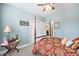 Comfortable bedroom with a four-poster bed and closet space at 8327 Childs Cove Cir, North Charleston, SC 29418