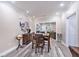 View of the dining room featuring hardwood floors and classic decor at 8327 Childs Cove Cir, North Charleston, SC 29418