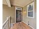 Front porch with wood floor, and secured by a screen door at 8327 Childs Cove Cir, North Charleston, SC 29418
