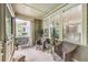Inviting porch with wicker chairs, plants, and open views at 8327 Childs Cove Cir, North Charleston, SC 29418