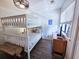 Comfortable bedroom featuring a bunk bed and a dresser with modern decor for a relaxing retreat at 837 Club Cottage Rd, Edisto Island, SC 29438