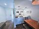 Stylish kitchen featuring stainless appliances, white cabinetry, and an open design that seamlessly connects to the dining area at 837 Club Cottage Rd, Edisto Island, SC 29438