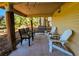 Inviting patio space with comfortable seating offers a tranquil spot for relaxation and enjoying the outdoors at 837 Club Cottage Rd, Edisto Island, SC 29438