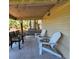 Cozy patio featuring an array of seating arrangements, perfect for relaxing with guests at 837 Club Cottage Rd, Edisto Island, SC 29438