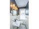 Stylish bathroom with a modern sink, dark grey walls, and a window for natural light at 88 Smith St, Charleston, SC 29401