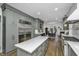 Bright kitchen with stainless steel appliances, marble countertops, and hardwood floors at 88 Smith St, Charleston, SC 29401