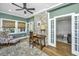 Charming office with a brick accent wall, hardwood floors, and natural light from the windows at 88 Smith St, Charleston, SC 29401