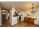 Inviting entryway with hardwood floors and access to the kitchen at 103 Toura Ln, Charleston, SC 29414