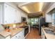 Bright kitchen with granite counters, overhead lighting, and black appliances at 103 Toura Ln, Charleston, SC 29414