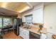 Kitchen with stainless refrigerator, granite counters and double sink at 103 Toura Ln, Charleston, SC 29414