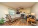 Comfortable living room with a fireplace, neutral paint, and hardwood floors, providing a relaxing atmosphere at 103 Toura Ln, Charleston, SC 29414