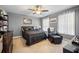 Comfortable bedroom with neutral color scheme and ceiling fan, providing a relaxing space at 105 Birkbeck Ct, Goose Creek, SC 29445