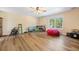 Spacious bonus room with laminated wood floor and natural light at 105 Birkbeck Ct, Goose Creek, SC 29445