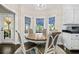 Cozy breakfast nook with bright windows and comfortable seating at 105 Birkbeck Ct, Goose Creek, SC 29445