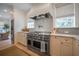 Gourmet kitchen with stainless steel appliances and tile backsplash at 108 Live Oak Dr, Mount Pleasant, SC 29464